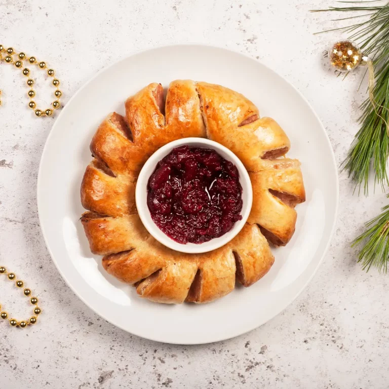 Turkey, Stuffing & Cranberry Rolls in wreath with cranberry sauce